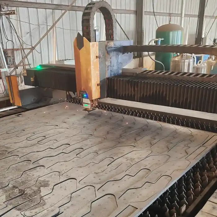 Laser cut carbon steel fabrication plate components inspection process